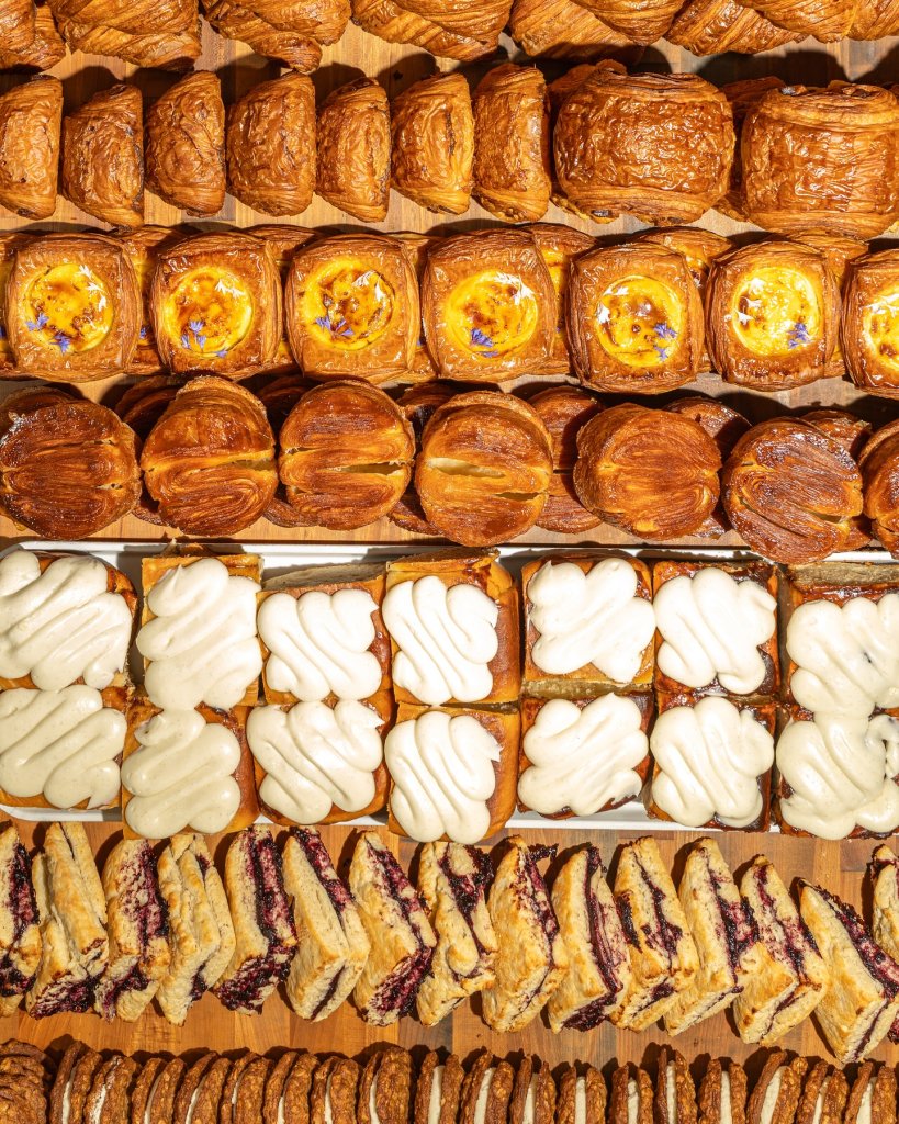 Assorted pastries and baked goods displayed on a wooden surface in Healdsburg, California.
