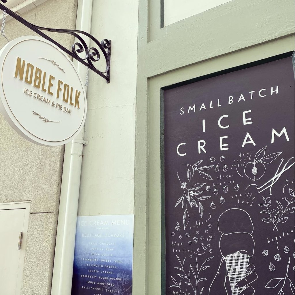 Hand-drawn chalkboard sign advertising small-batch ice cream flavors with a focus on heritage and natural ingredients in Healdsburg, California.