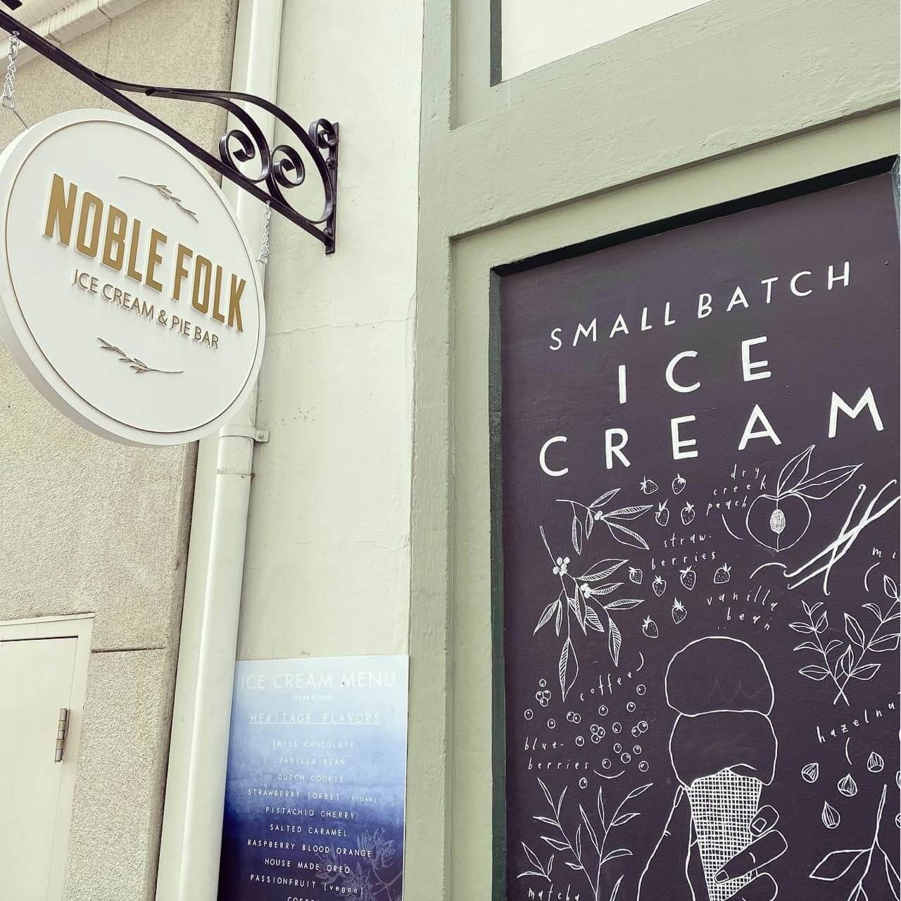 Hand-drawn chalkboard sign advertising small-batch ice cream flavors with a focus on heritage and natural ingredients in Healdsburg, California.
