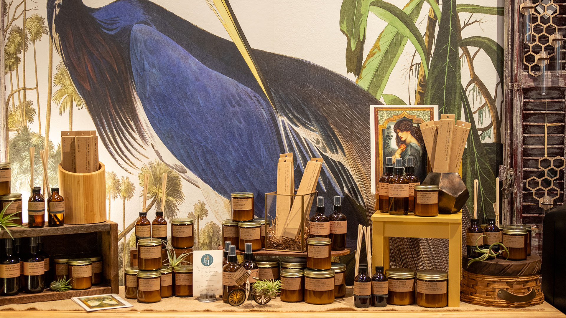 Shopping A display of artisanal candles, soaps, and home decor in a tropical-themed setting in Healdsburg, California.