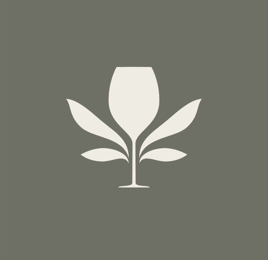 A stylized wine glass with a stem that transforms into three leaves, resembling a plant or tree in Healdsburg, California.